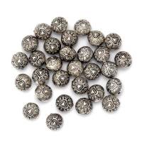 Perles antiques en métal